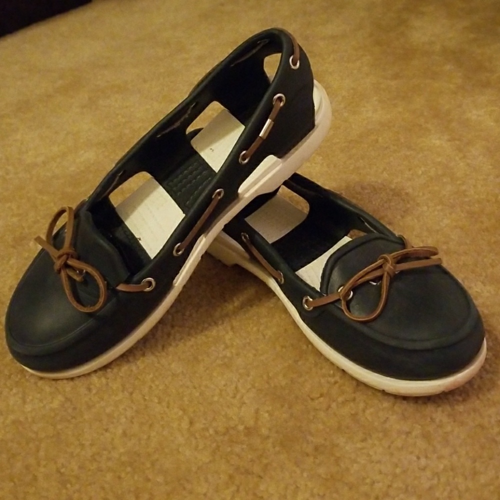 2 Crocs boat shoes ON HOLD